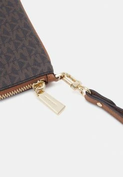 MICHAEL Michael Kors JET CHARM WRISTLET - Clutch - Brown -MICHAEL Michael Kors shop 237f41fc5c9e4fb9aed26fccb2534e5b