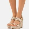 MICHAEL Michael Kors FARRAH WEDGE - Platform Sandals - Pale Gold -MICHAEL Michael Kors shop 253b6fc57e264d99a2110df308d85e52