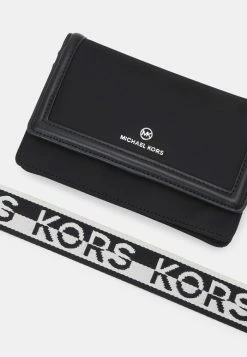 MICHAEL Michael Kors JET PHONE XBODY - Wallet - Black/optic White -MICHAEL Michael Kors shop 34e749a88f65452f964c660375f3013e