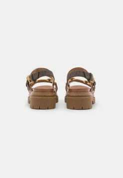 MICHAEL Michael Kors KAILEY LUG FLAT SANDAL - Platform Sandals - Brown -MICHAEL Michael Kors shop 4594f6d33106451d973abd01ee593501