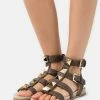 MICHAEL Michael Kors WREN GLADIATOR - Sandals - Brown
