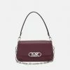 MICHAEL Michael Kors PARKER POUCHETTE - Handbag - Merlot -MICHAEL Michael Kors shop 528924258a4247ffa830000a9b175a7b