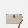 MICHAEL Michael Kors JET SET WRISTLET - Wallet - Vanilla -MICHAEL Michael Kors shop 64e14d393aad449686bf354d4cf96636