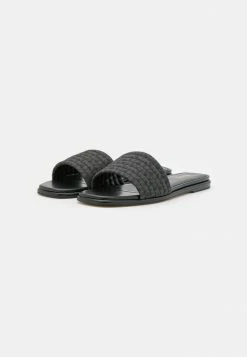 MICHAEL Michael Kors SADLER SLIDE - Mules - Black -MICHAEL Michael Kors shop 6e1edaa27798473a8d5796af54a7b745