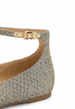 MICHAEL Michael Kors TIA FLEX FLAT - Ankle Strap Ballet Pumps - Gold -MICHAEL Michael Kors shop 6e2589c0864c482bb213b6ca7509787e