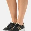MICHAEL Michael Kors IRVING STRIPE LACE UP - Trainers - Black -MICHAEL Michael Kors shop 75b733f7077d4dc68032293280ce4c12
