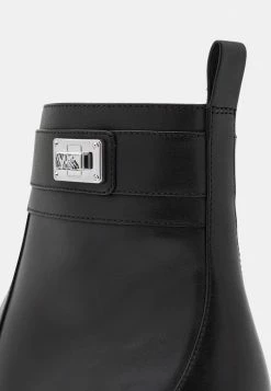 MICHAEL Michael Kors PADMA STRAP FLAT BOOTIE - Classic Ankle Boots - Black -MICHAEL Michael Kors shop 7cc386c2bfe54c34a9b15b2e148080ca