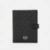 MICHAEL Michael Kors HERITAGE TAB PASSPORT WALLET - Passport Holder - Black -MICHAEL Michael Kors shop 7dd12e94a8cf40b6a5d9b95046408ddc