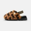 MICHAEL Michael Kors JANIS KAMRYN - Slippers - Tan/black -MICHAEL Michael Kors shop 99bfb025e6db44bb832577f9e95a448b