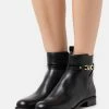 MICHAEL Michael Kors FARRAH FLAT BOOTIE - Classic Ankle Boots - Black -MICHAEL Michael Kors shop a74247412a9e42fd9afdea0370eb0248