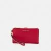 MICHAEL Michael Kors JET WRISTLET - Wallet - Crimson -MICHAEL Michael Kors shop ad8e3196afb3432cb3ef70ac89743354