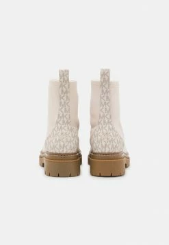 MICHAEL Michael Kors COMET LUG BOOTIE - Classic Ankle Boots - Light Cream -MICHAEL Michael Kors shop cd188f6d757c4d9196f441cbf2bc9901