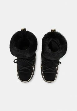 MICHAEL Michael Kors ZELDA BOOTIE - Lace-up Ankle Boots - Black/gold -MICHAEL Michael Kors shop cd3b22ac7d6d463b8eba22c4d056d133