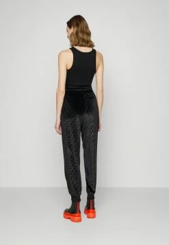 MICHAEL Michael Kors LOGO SLOUCHY - Tracksuit Bottoms - Black -MICHAEL Michael Kors shop dbfe8d7ddec248f180397e7f6dd170cf