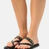 MICHAEL Michael Kors ALBA THONG SLIDE - T-bar Sandals - Black -MICHAEL Michael Kors shop deb6e21cd3f94de19947388c9c926ef3