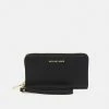 MICHAEL Michael Kors JET SET WALLET - Wallet - Black -MICHAEL Michael Kors shop e890b08538bc400ebb00c302174a7544