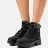 MICHAEL Michael Kors DUPREE HIKER BOOTIE - Platform Ankle Boots - Black -MICHAEL Michael Kors shop f0a791f227784aa89eba64084967a2a5