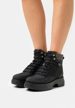 MICHAEL Michael Kors DUPREE HIKER BOOTIE - Platform Ankle Boots - Black