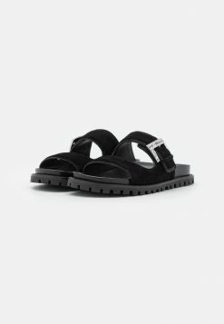 MICHAEL Michael Kors GISELLE SLIDE - Mules - Black -MICHAEL Michael Kors shop f2f1f236a7254b609c25f1ebcdc048d3
